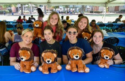 Students with stuffed animals